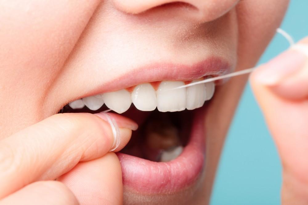 The Role of Flossing in Achieving Perfectly Healthy Teeth and Gums